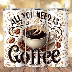 May include: A set of three white insulated tumblers with a coffee theme. Each tumbler features a repeating pattern of coffee beans and the phrase "All You Need Is Coffee" with a coffee cup graphic. Includes a straw.