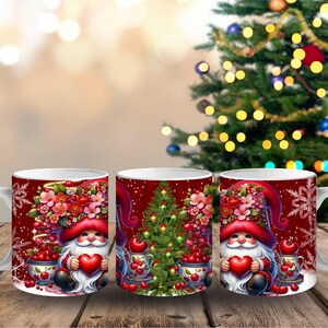 May include: Three white ceramic mugs with a Christmas gnome design. The mugs feature a red background with a gnome holding a heart, flowers, and a Christmas tree. The mugs are on a wooden surface.