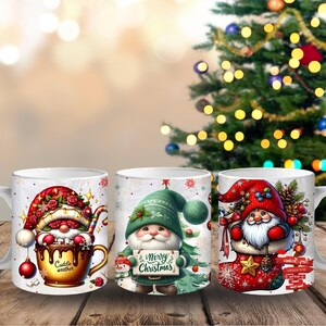 May include: Three white ceramic mugs with Christmas gnome designs. One mug features a gnome in a red hat, another in a green hat holding a sign that says "Merry Christmas", and the third in a red hat in a stocking. The mugs are on a wooden surface.