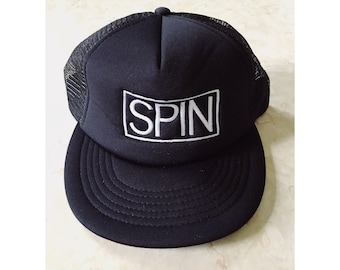 Spin Magazine Embroidered Logo Trucker Hat Black and White