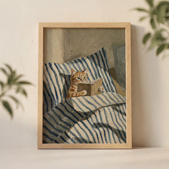 Orange Ginger Cat Reading Book in Bed Wall Art Print, Cozy Tabby Illustration with Striped Pillow and Soft Sunlight