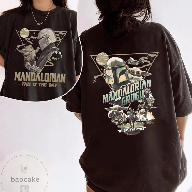 May include: Black t-shirt featuring a graphic of The Mandalorian and Grogu. The front design includes the text "MANDALORIAN - THIS IS THE WAY." The back design features the text "STAR WARS THE MANDALORIAN AND GROGU - THIS IS THE WAY."