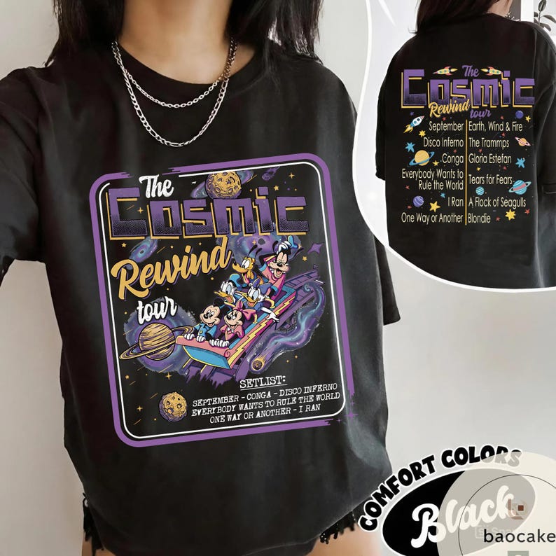 May include: Black t-shirt featuring a graphic for "The Cosmic Rewind Tour." The design includes cartoon characters on a space-themed ride, with text listing the setlist and tour details. The back of the shirt also has the tour name and setlist.