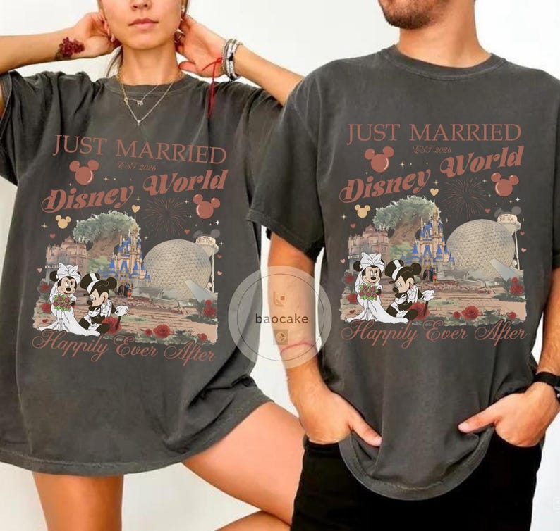 May include: Two charcoal gray t-shirts with a Disney World wedding theme. The shirts feature the text "Just Married" and "Happily Ever After", along with images of Mickey and Minnie Mouse in wedding attire, and Disney World landmarks.