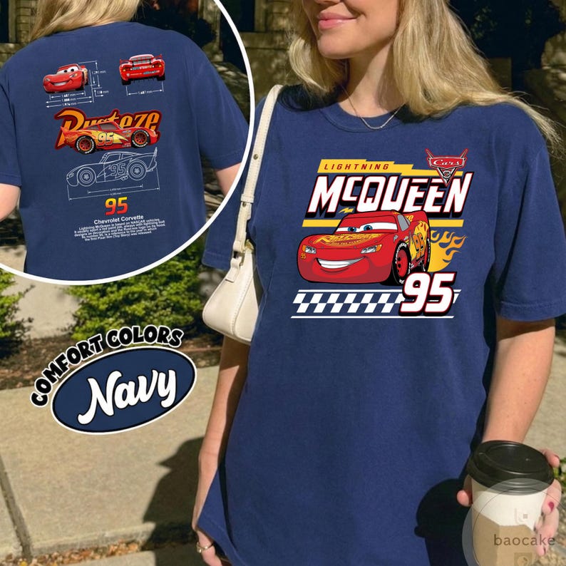 May include: A navy blue t-shirt featuring a graphic of Lightning McQueen from the movie Cars. The front displays the character with the text Lightning McQueen and 95. The back shows technical drawings, the Rust-eze logo, and descriptive text.