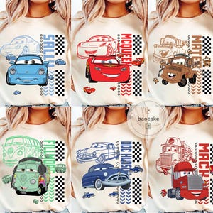 May include: Crew neck sweatshirts with cartoon car designs. Each top displays a different character, including Sally, McQueen, Mater, Doc Hudson, Fillmore, and Mack. The designs incorporate checkered flag and arrow details.