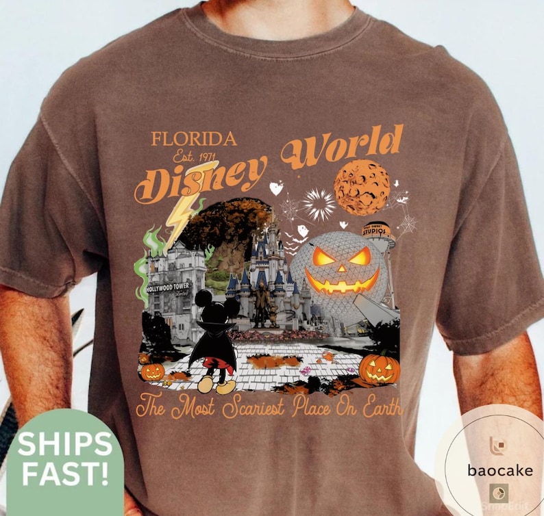 May include: Brown t-shirt with a Halloween-themed graphic. The design includes the text "FLORIDA Disney World" and "The Most Scariest Place On Earth". The graphic features a castle, Mickey Mouse, and jack-o'-lanterns.