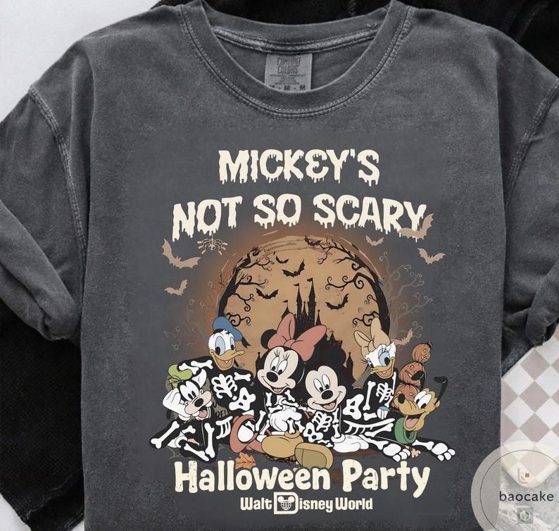 May include: Dark gray t-shirt featuring a Halloween design with Mickey Mouse and friends in skeleton costumes. The shirt includes the text "Mickey's Not So Scary Halloween Party" and "Walt Disney World".