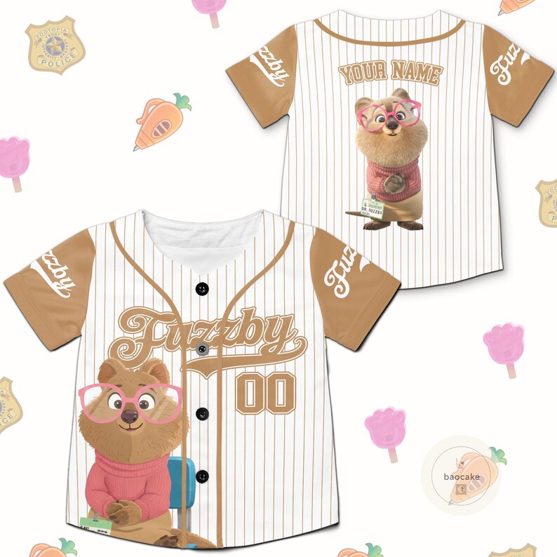 May include: White and brown baseball jersey with a cartoon quokka wearing glasses and a pink sweater. The jersey has the text "Fuzzyby" and the number "00". The sleeves are brown.