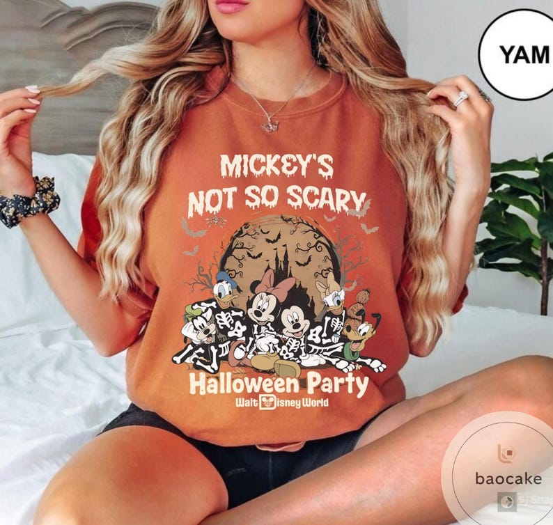 May include: Orange t-shirt with the text "Mickey's Not So Scary Halloween Party" and Disney characters in skeleton costumes. The design includes bats, a full moon, and the Walt Disney World logo.