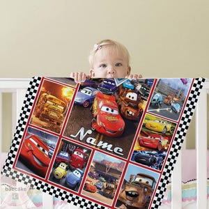 May include: A rectangular blanket featuring a collage of various animated car characters from the movie Cars, including a prominent red race car in the center. The design includes a black and white checkered border and the word Name in white script.