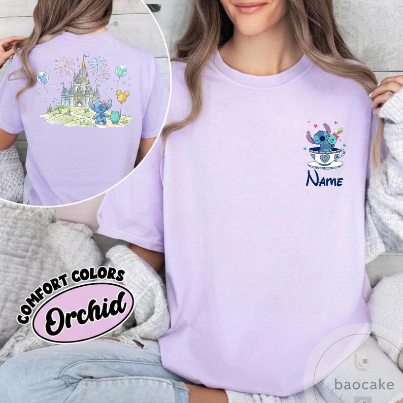 May include: Orchid-colored t-shirt featuring a cartoon Stitch design. The front has a small Stitch in a teacup design with the word "Name" below. The back has a larger Stitch and castle design with fireworks and balloons.