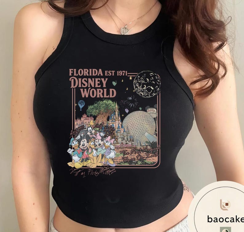 May include: A black sleeveless tank top featuring a graphic print with the text FLORIDA EST 1971 DISNEY WORLD and The Most Magical Place On Earth. The design includes illustrations of Disney characters, the castle, and the Epcot sphere.