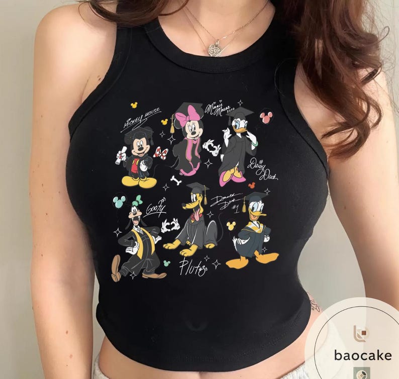 May include: Black tank top featuring a colorful graphic of Disney characters in graduation attire. Mickey Mouse, Minnie Mouse, Donald Duck, Daisy Duck, Goofy, and Pluto are depicted with graduation caps and gowns. The words "Mickey Mouse", "Minnie Mouse", "Daisy Duck", and "Goofy" are written on the top.