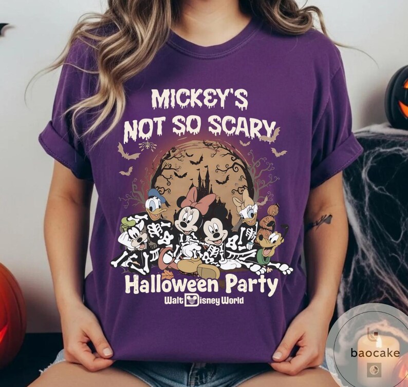 May include: A purple t-shirt with the text "Mickey's Not So Scary Halloween Party" and Disney characters in skeleton costumes. The design includes a full moon, bats, and a castle silhouette. Walt Disney World logo is at the bottom.