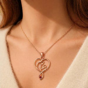 Continuous Line Heart Pendant, Minimalist Ribbon Jewelry, Ruby Accent Motherhood Necklace, Gift for Mom, Elegant Silver Wrap Design