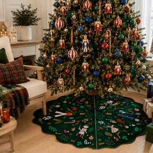 May include: A round, dark green velvet Christmas tree skirt with a scalloped edge, featuring a printed pattern of nutcracker figures, candy canes, holly leaves, and small ornaments. The skirt has a central opening and a slit for easy placement.