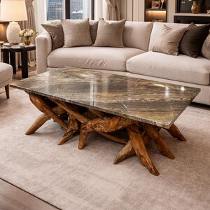 May include: A rectangular coffee table with a natural wood base and a stone top. The base is made of intertwined, light brown wooden branches. The tabletop has a marbled appearance with shades of brown, grey, and gold. The table is in a living room setting.