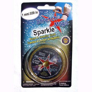 May include: A package of Stretch Magic Sparkle bead and jewelry cord. The cord is gold and measures 1 mm/.039 in diameter and 16 feet in length. The packaging includes the text "Sparkle Bead & Jewelry Cord".