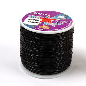 May include: A spool of 100 metres of black stretch magic cord, 1 mm thick. The label reads "Stretch Magic" and "Strong & Stretchy/Resistente & Flexible".