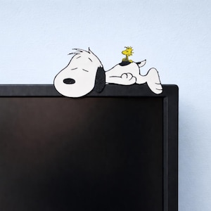 Snoopy on monitor with stand