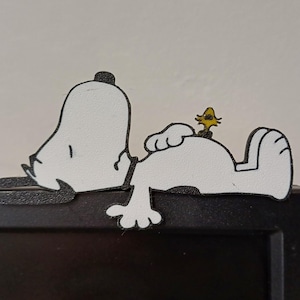 Snoopy on monitor with stand