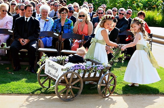 flower girl in a wagon