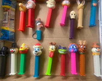 Vintage PEZ Dispenser Lot – 18 Collectible Characters + Bonus Candy | Star Wars, Holiday & Cartoon Themes