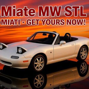 May include: A white convertible car with pop-up headlights is reflected in a glossy surface. The car has black seats and silver wheels. Text at the top reads "Miate MW STL" and "MIATI - GET YOURS NOW!" in red and white.