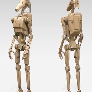 May include: Two tan-colored battle droid figures are shown from the front and back. The droids have a slender, mechanical design with articulated limbs, a rectangular torso, and a cone-shaped head. The back of one droid has the word "MRKD" printed on it.