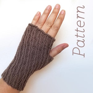 May include: Brown knitted fingerless gloves with a chevron pattern. The gloves are shown on a hand with the fingers extended.