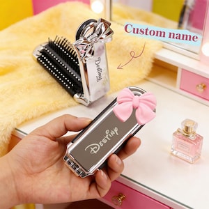 May include: A set of three ceramic mugs with a speckled, matte finish in cream, light grey, and dark grey. Each mug has a simple, minimalist design, ideal for coffee or tea.