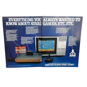 May include: An advertisement for Atari video games. The ad features a console, joysticks, and a television screen displaying a game. Text includes "Everything You Always Wanted to Know About Atari Games, Etc, Etc."