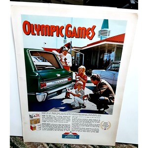 May include: A vintage advertisement for Howard Johnson's Restaurants and Motor Lodges featuring a green station wagon and a family of four. The ad promotes a sweepstakes to support the U.S. Olympic Team. The text reads "Olympic Games" and "How to Win Easy Exciting. Anyone can enter. Nothing to buy. Just get your Olympic Sweepstakes registration blank at any Howard Johnson's Restaurant or Motor Lodge. You have 2019 chances to win."