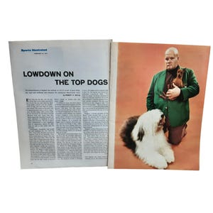 May include: A vintage magazine spread from Sports Illustrated, featuring the headline "Lowdown on the Top Dogs." The right page shows a man in a green jacket holding two dogs, with a large Old English Sheepdog in the foreground.