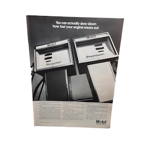 May include: Black and white advertisement featuring two Mobil gas pumps, one labeled "Regular" and the other "Premium." The text at the top reads, "You can actually slow down how fast your engine wears out."