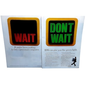 May include: Two vintage IBM advertisements. One features the word "WAIT" in red against a black background, the other says "DON'T WAIT" in green. Both are in a yellow square. Text below reads "If you've been waiting to buy a personal computer."