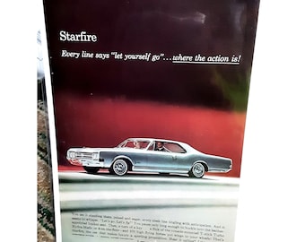 1965 Oldsmobile Starfire The Rocket Action Car Print Ad vintage 60s
