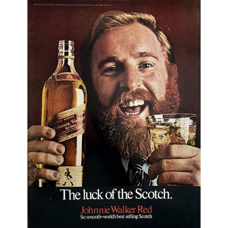May include: Vintage advertisement for Johnnie Walker Red Label Scotch whisky. The image features a smiling man holding a bottle of whisky and a glass with ice. The text reads "The luck of the Scotch." and "Johnnie Walker Red".