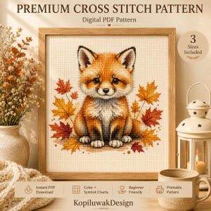 Può includere: Uno schema digitale a punto croce con una volpe carina circondata da foglie autunnali arancioni e rosse. Il testo recita PREMIUM CROSS STITCH PATTERN, Digital PDF Pattern, 3 Sizes Included, Instant PDF Download, Color + Symbol Charts, Beginner Friendly, Printable Pattern e KopiluwakDesign.