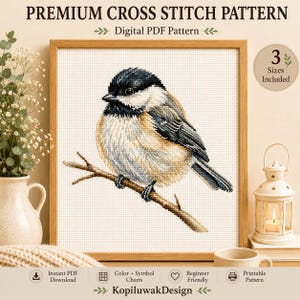 Könnte beinhalten: Ein Kreuzstichmuster mit einem Vogel auf einem Ast, gerahmt in einem Holzrahmen. Der Vogel hat schwarze, weiße und beige Federn. Der Text "PREMIUM CROSS STITCH PATTERN" und "Digital PDF Pattern" stehen oben. 3 Größen sind enthalten.