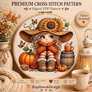 Può includere: Uno schema a punto croce con una bambina che indossa un grande cappello a girasole, un maglione arancione e stivali, circondata da zucche, farfalle e una tazza su un barile. Il testo recita PREMIUM CROSS STITCH PATTERN, Digital PDF Pattern, 3 Sizes Included e KopiluwakDesign.
