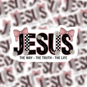 The sticker features the word “JESUS” in bold, playful lettering with a coquette-inspired aesthetic. The design includes pink bows, small daisy flowers, and a trendy checkerboard pattern, giving it a feminine, cute, and modern look. Beneath the main text is the phrase “The Way – The Truth – The Life,” referencing John 14:6.