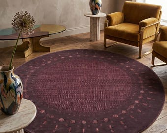 Alfombra redonda de lana auténtica tejida a mano Gabbeh Loribaft - Alfombra persa circular premium de textura gruesa, color burdeos, granate, con diseño geométrico tribal.