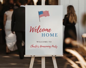May include: A white rectangular sign on a wooden easel featuring a graphic of an American flag, the red and blue text "Welcome HOME", and the black and red text "WELCOME TO Charlie's Homecoming Party" printed on the front surface.