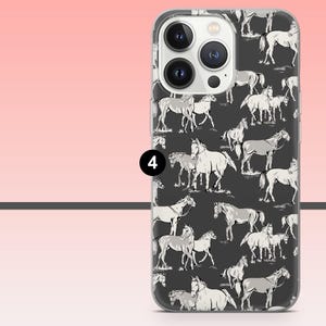 May include: A clear phone case featuring a repeating pattern of white horses on a dark gray background. The horses are depicted in various poses, creating a dynamic and artistic design. The case has a glossy finish.