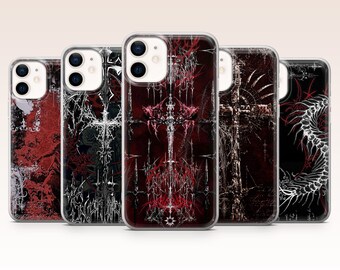 May include: Five clear smartphone cases arranged in a row, each featuring distinct dark, intricate graphic designs in black, white, and deep red. The patterns include ornate cross motifs, sharp linear elements, and skeletal, spine-like structures.