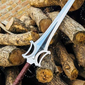 Dramatic angled view of He Man Power Sword with reflective blade fantasy weapon cinematic lighting