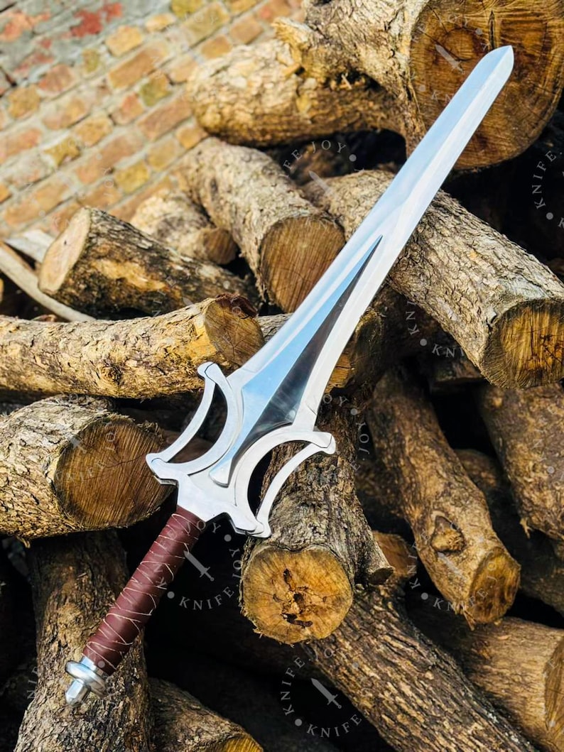 Dramatic angled view of He Man Power Sword with reflective blade fantasy weapon cinematic lighting
