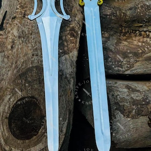 Close up of carbon steel blade He Man power sword replica showing detailed finish and craftsmanship